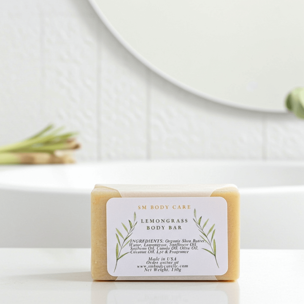 Bar of lemongrass body bar soap with a label on a white surface.