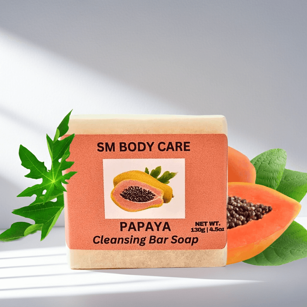 SM Body Care Papaya Cleansing Bar Soap with papaya fruit and leaves on a light gray background